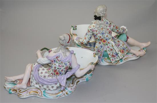 A pair of Meissen figural sweetmeat dishes, 19th century, length approx. 28cm, both with losses and slight restorations